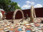 Sculpture of a snake inside Rock Garden, made of Concrete and Tile pieces